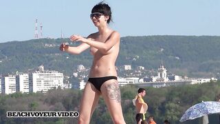 Hot Nudist Girl Topless showing boobs on nude beach 734