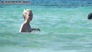 Hot Nudist Girl Topless showing boobs on nude beach 661