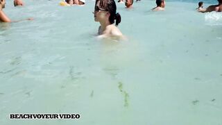 Hot Nudist Girl Topless showing boobs on nude beach 739