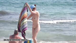 Hot Nudist Girl Topless showing boobs on nude beach 733