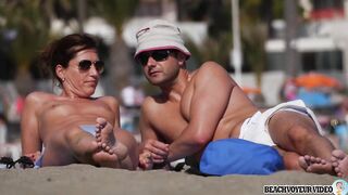 Sexy Nudist Babe Topless showing tits on nude beach 868