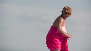 Sexy Nudist Babe Topless showing tits on nude beach 936