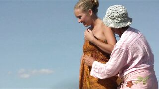 Sexy Nudist Babe Topless showing tits on nude beach 965