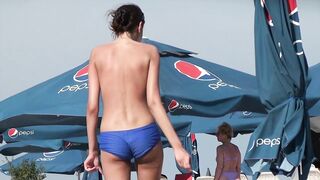 Sexy Nudist Babe Topless showing tits on nude beach 948