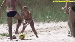 Sexy Nudist Babe Topless showing tits on nude beach 907