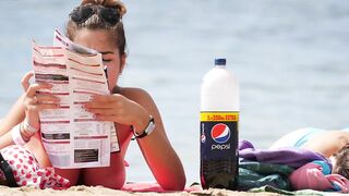 Sexy Nudist Babe Topless showing tits on nude beach 876