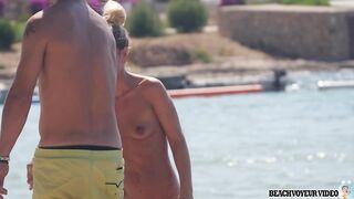 Sexy Nudist Babe Topless showing tits on nude beach 893