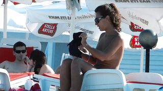 Sexy Nudist Babe Topless showing tits on nude beach 968