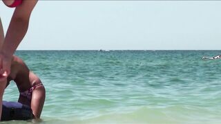 Sexy Nudist Babe Topless showing tits on nude beach 1016