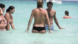 Sexy Nudist Babe Topless showing tits on nude beach 1013