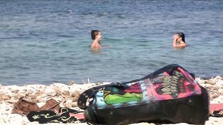 Juicy Nudist Girl Topless showing perfect boobs on nude beach in public 1114